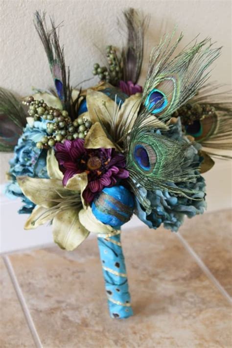 terrific teal bridal bouquet peacock by southerngirlweddings