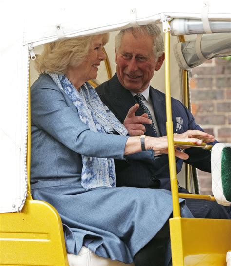 The Prince Of Wales And Duchess Of Cornwall Take A Ride In A Rickshaw