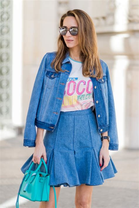 A Buttoned Denim Jacket With A Flared Skirt How To Wear Denim On