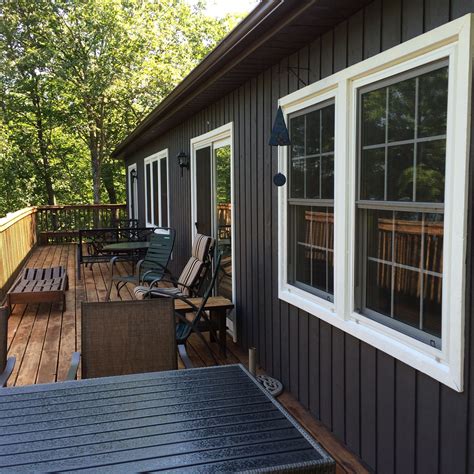 Wrought iron is a deep dark gray with a softness and warmth to it. End Result: BM simply white trim and iron mountain ...
