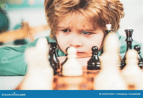 Son Are Playing Chess And Smiling At Home Kids Chess School Little