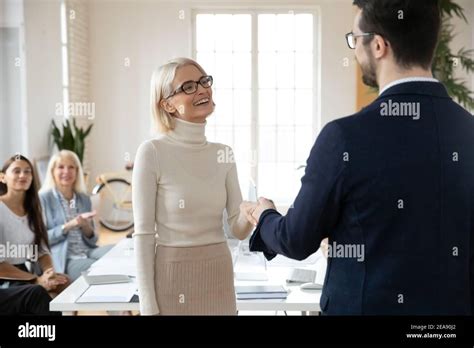 Company leader hiring female professional for job Stock Photo - Alamy