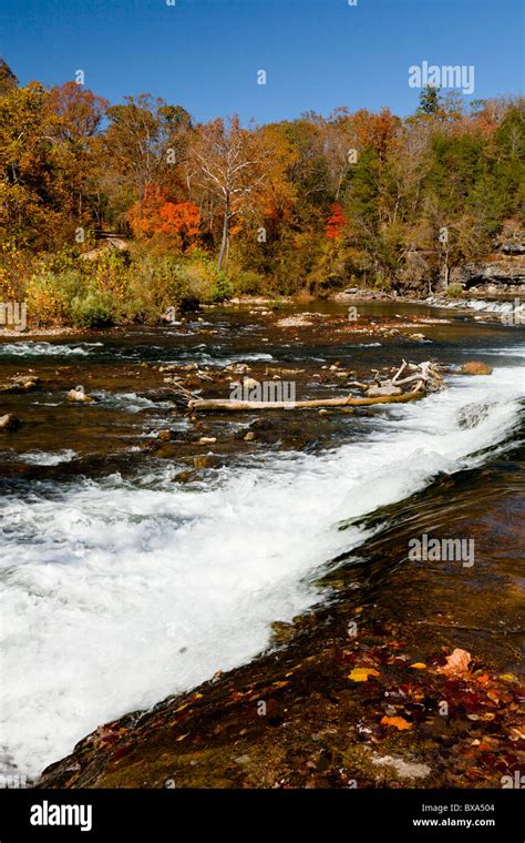 A Waterfall Along A Stream In The Ozarks With Fall Foliage Color In