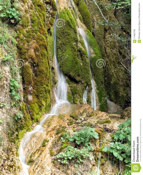 Beautiful Landscape Of A Waterfall With Green Moss Stock Photo Image