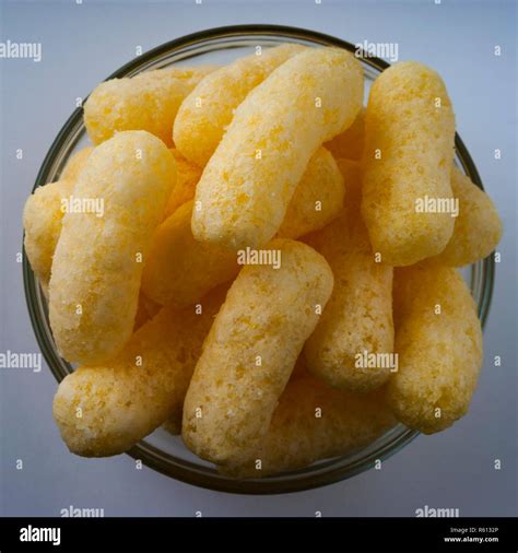 Corn Puffs In A Glass Bowl Crunchy Flavored Puffed Snacks Party