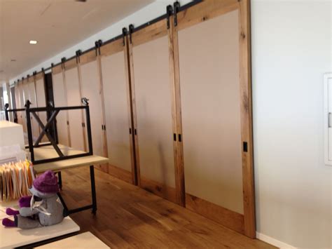 This is the best way to block the outside view. Row-of-sliding-barn-doors-lighweight-high-strength-eco ...