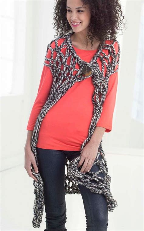 The body is worked seamlessly and ribbing added to the sleeves to complete the short sleeve style of this gorgeous pullover. l32465a | Arm knitting, Arm knitting scarf, Finger knitting