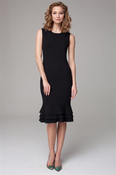 Elegant black midi dress with ruffled hemline