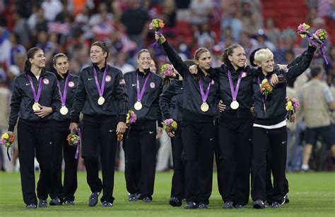 Us Womens Soccer Team Rejoices After A Gold Medal Effort Against Japan