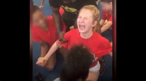 Caught On Camera Denver Cheerleader Screams In Agony As The Coach Forces Her Into A Split