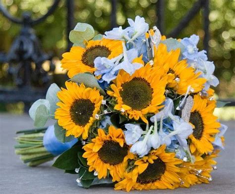 If you are looking for bespoke wedding flowers please call us on 01730 818 300. Daffodil and Blue Flower Wedding Bouquet Posy | Blue ...