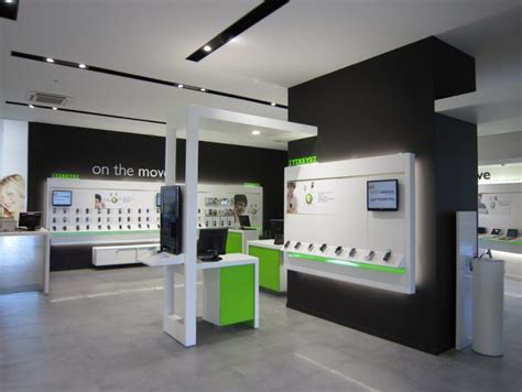 Furniture design for mobile shop. #031 Cosmote Mobile Phone & Accessories Store in Athens ...