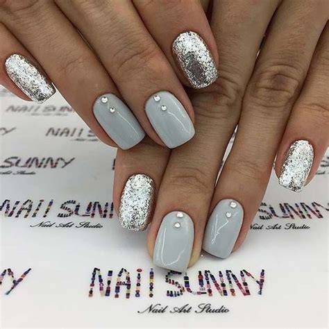 Picture Of A Holiday Or Wedding Manicure With Shiny Grey Nails Accented