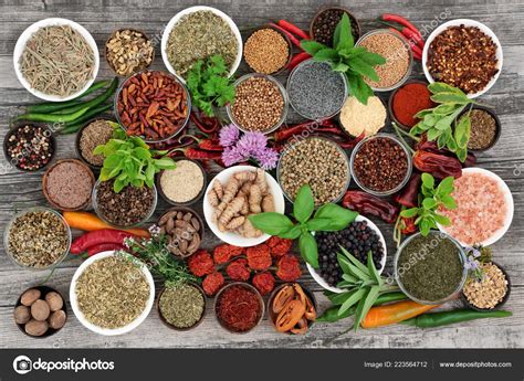 Large Herb Spice Food Selection Dried Fresh Rustic Wood Background