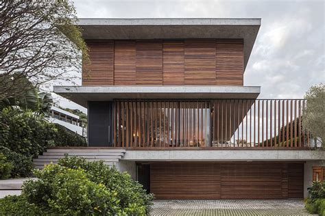 Bravos House Encased In Moving Wooden Panels And Slats