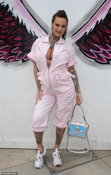 Jemma Lucy Highlights Her Bump In A Plunging Pink Jumpsuit As She