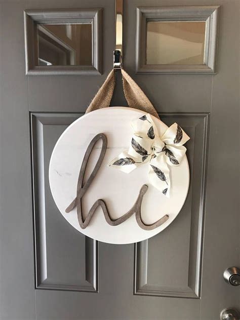 I always think that looks really neat and it got me to thinking anyway, you'll notice that the hanger basket is actually on our wall next to the door instead of on the door itself. White Front Door Hanger Door Hanging Decor Sign For Front ...