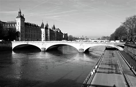 When looking at paris from above, you can clearly see how the seine cuts the city in half and you can also appreciate how architecture and city planning over the centuries has followed the course of the. Pont au Change Napoleonic Bridge over Seine River by ...