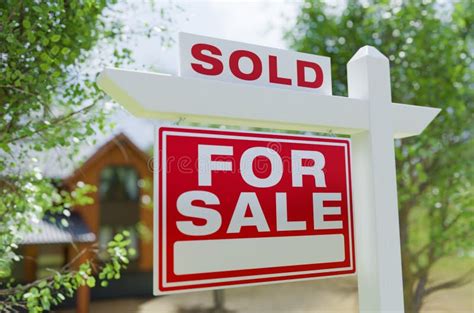 Sold For Sale Real Estate Sign In Front Of Property Stock Photo Image