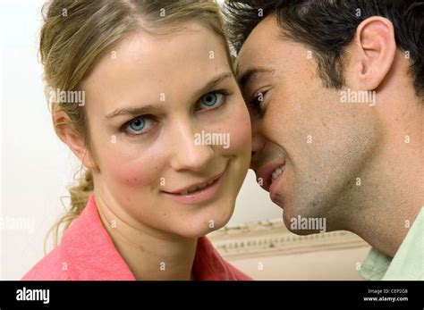 Male Kissing Females Neck Stock Photo Alamy