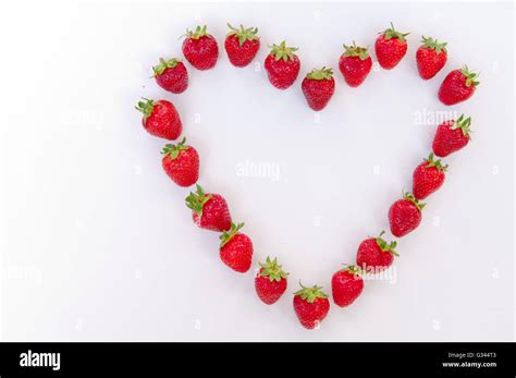 Heart Shaped Strawberries On White Background Strawberry Heart