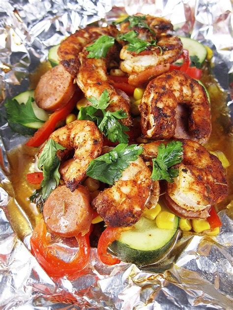 Skip the boring chicken dinners and try some of these shrimp recipes instead. Cajun Shrimp and Sausage in Foil Packets | Recipe | Dinner, Cajun shrimp, Sausage