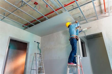 The dropped ceiling may have been installed to deal with a plaster ceiling which become detached from the lath and cracked buckled and sagged. A Guide on Expert Acoustic Ceiling Installation | Ceiling ...