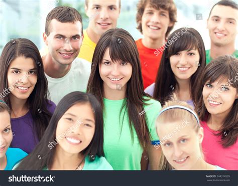 Group Cheerful Young People Posing Together Stock Photo 144314539