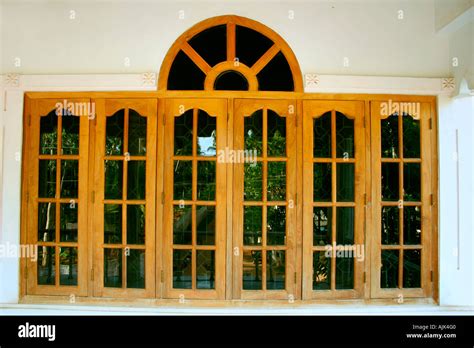 The Glass Windows Of A Modern House With A Wooden Framework Stock Photo