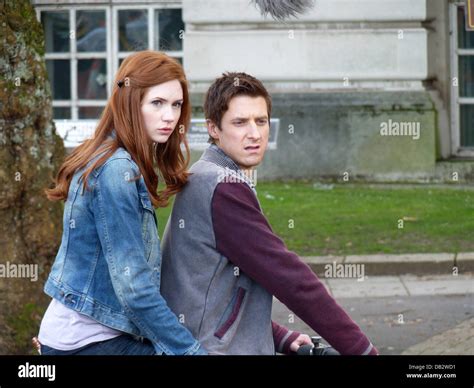 Arthur Darvill And Karen Gillan Ride On A Motorcycle On The Set Of The Bbc Sci Fi Series Doctor