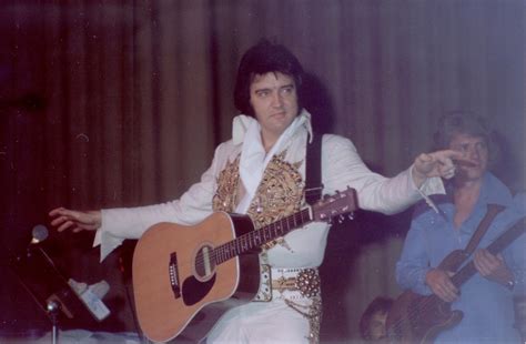 Elvis returning home, from all guesses he probably has been to the cemetery to pay his respects to his mother. Elvis Presley Concert at Baltimore Civic Center (1977 ...