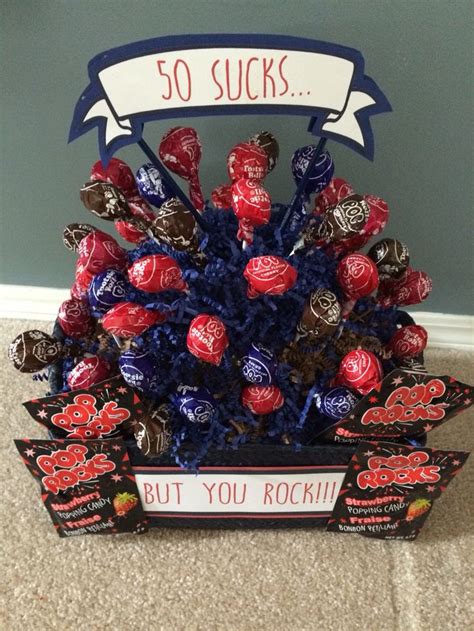 Some presents that are great are wine, gift cards, or jewelry. Birthday Bouquet. 50 sucks but you rock. Made with Tootsie ...