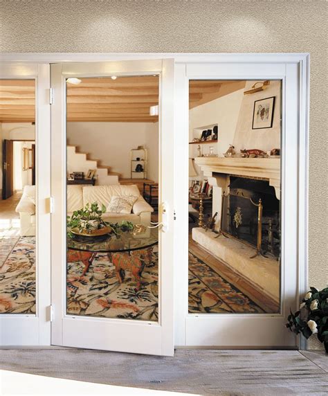 An interior french door is a door that has multiple windows set into it, the full length of the door. French Doors open up this living room for expanded views ...