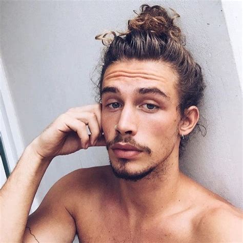 If you were born with curly hair, you should strongly consider ditching the flat iron and flaunting your ringlets with pride. Easy Messy and Curly Bun | Long hair styles men, Man bun ...
