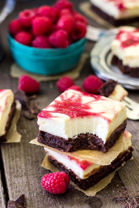 Mix all nuts and vanilla wafer crumbs with melted butter and press into a 9 inch buttered springform pan, trying to line the sides as much as possible about 1 1/2 up the sides of the pan, set aside. Raspberry Cheesecake Brownies - Sugar Spun Run