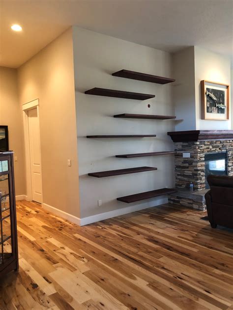Floating shelves mount to the wall without any visible means of attachment or support, which floating shelves are often easier to hang, too, and the clean, simple design allows you to truly show. Floating Bookshelves - boisecustomfurniture.com