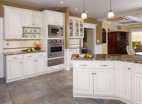5/8 cabinet grade plywood shelves with metal shelf rests. Winter White Walnut Glaze cabinets with a granite ...