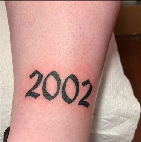 10 Amazing “2002” Tattoo Designs | Body Art Guru