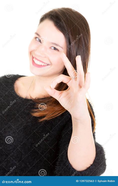 Close Up Photo Of Funny Young Brunette Woman Showing Ok Gesture Looking At Camera Stock Image