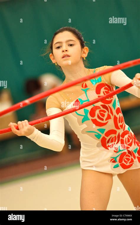 Young Girl Performing Exercise With Gymnastic Circle Ferrara B Series