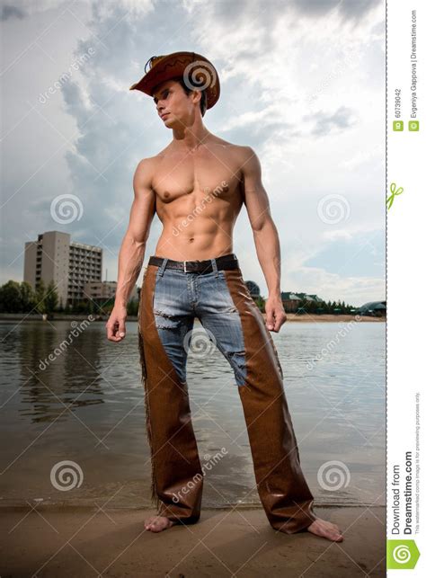 Sporty, Athletic, Muscular Man In A Cowboy Outfit Stock Photo - Image