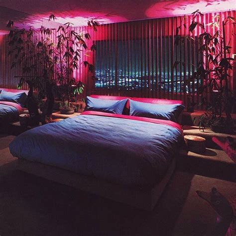 ermmm yes please we do want to sleep here proof that a neon bedroom with its retro vibe can