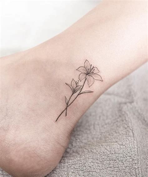 117 Of The Very Best Flower Tattoos Tattoo Insider Lily Flower