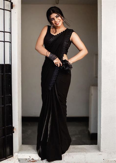 suju vasan beautiful stills in black saree south indian actress saree look sarees for girls