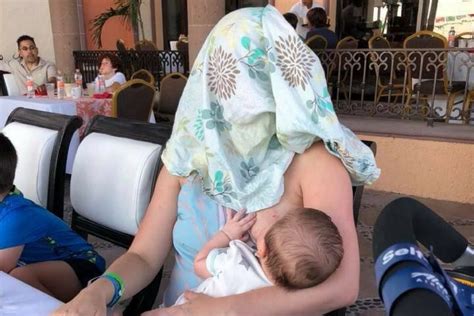 A Mother Breastfeeds Her Baby In A Restaurant A Stranger Asks Her To