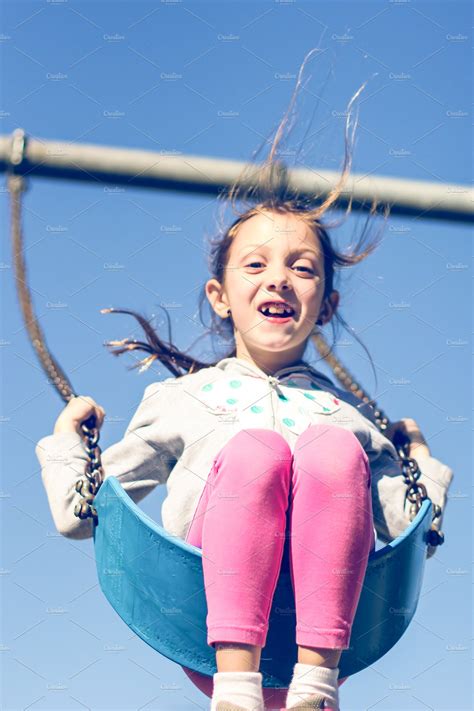 Happy Girl On A Swing High Quality People Images ~ Creative Market
