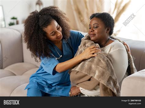 Caring Curly Nurse Image And Photo Free Trial Bigstock