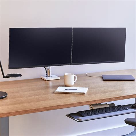 It is compatible with 17 inches to 32 inches wide and 17.6lbs of weight. M8.1: Adjustable Dual Monitor Arm | Humanscale