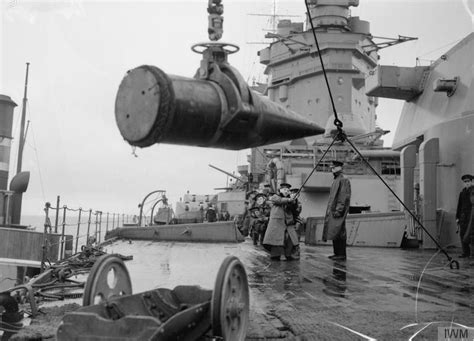 Hms Rodney 16 Shells Being Lowered On To The Battleships Deck From
