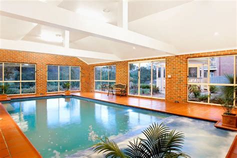 An indoor pool is a great choice in climates where it may not be warm enough to swim outside too often. 20 Homes With Beautiful Indoor Swimming Pool Designs